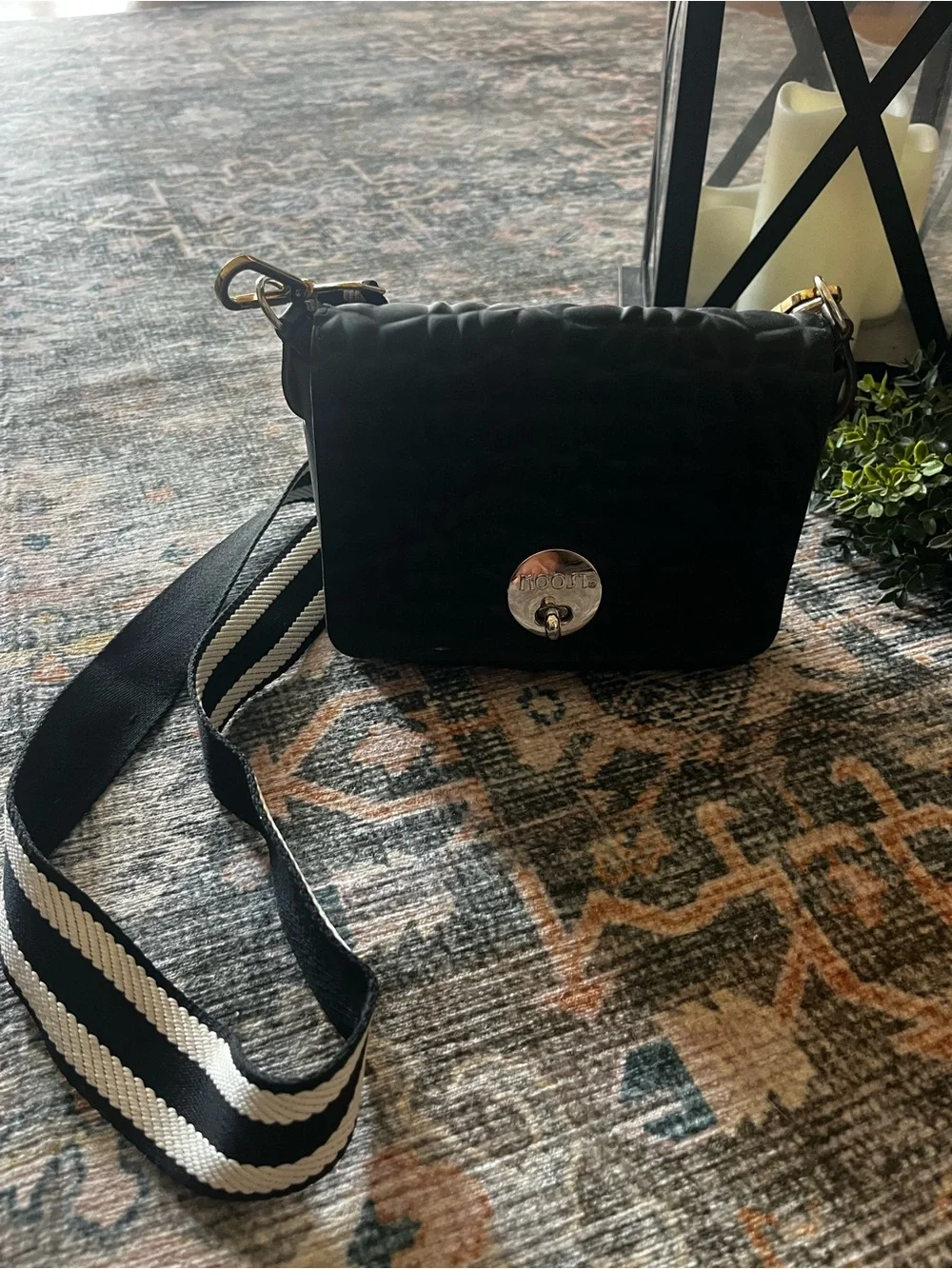 MOOST Black Quilted Crossbody Bag with Striped Strap